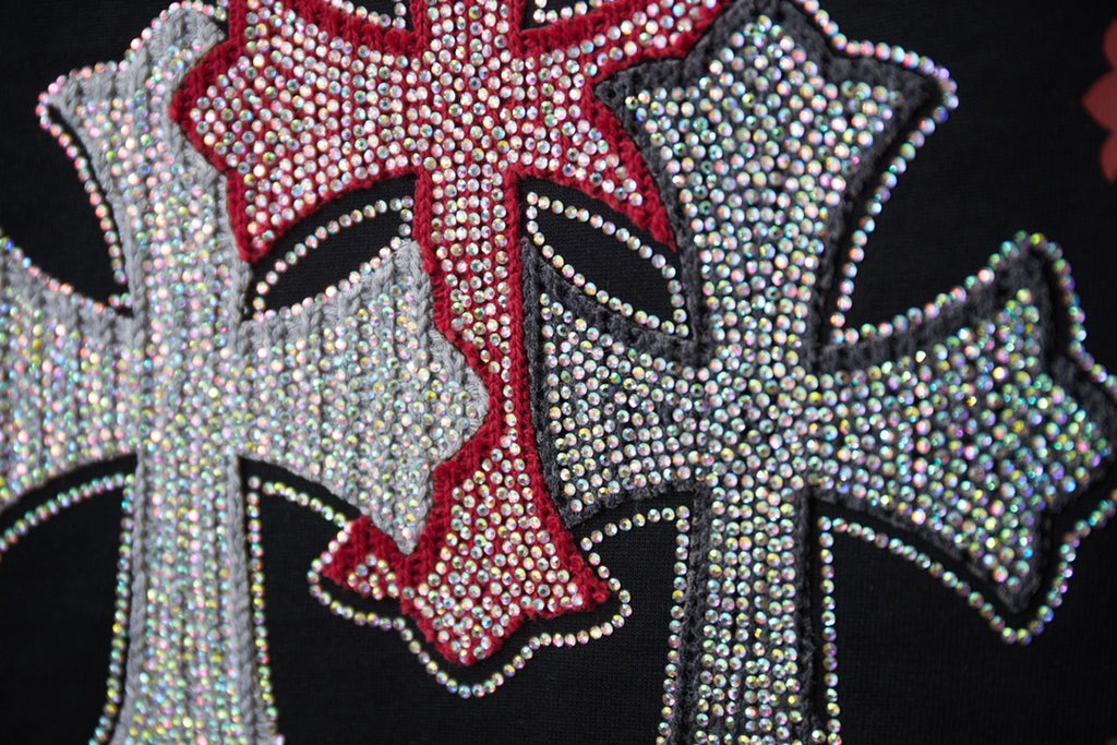 Embellished cross graphic with red center and silver rhinestone trim on black T-shirt