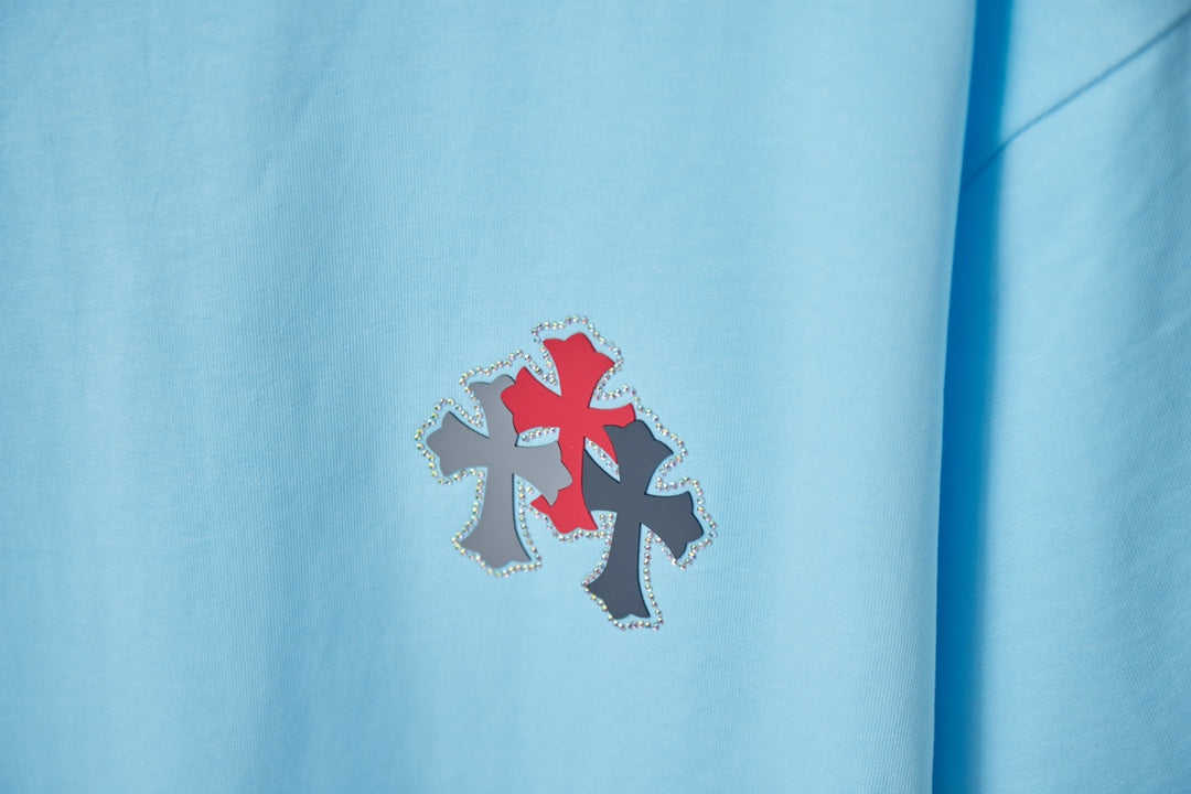 Light blue Chrome Hearts T-shirt panel with red and dark cross embellishment