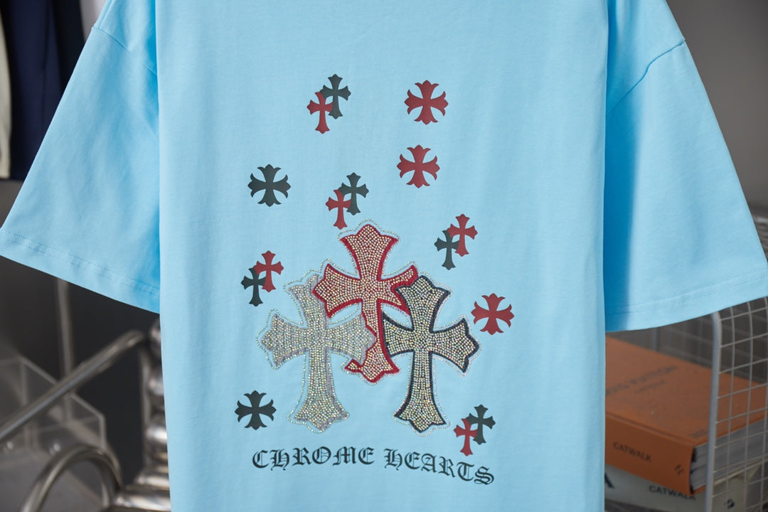 Light blue Chrome Hearts short-sleeve T-shirt back with cross motif and 'Chrome Hearts' text