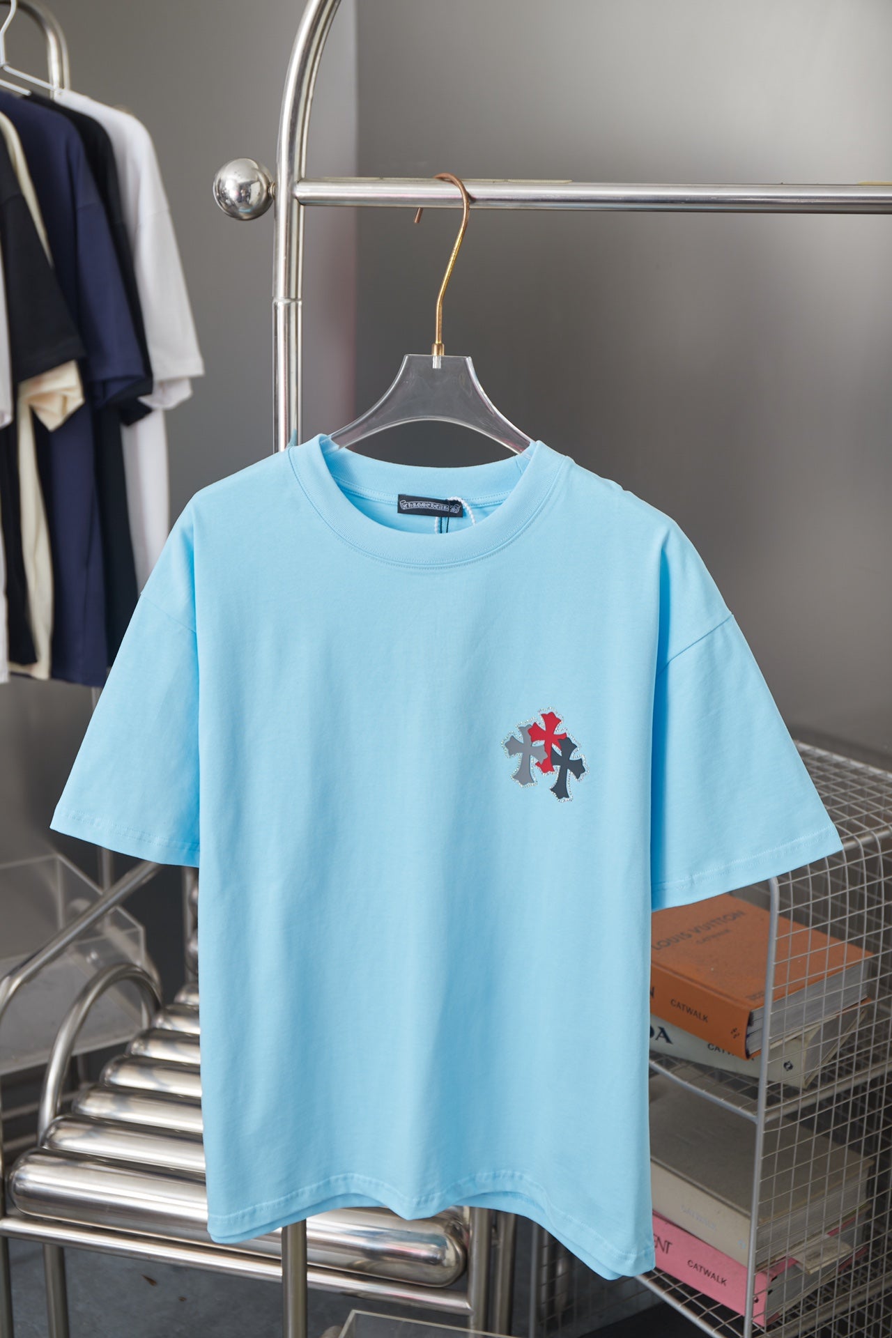 Light blue Chrome Hearts short-sleeve T-shirt with small multicolor cross graphic