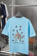 Light blue Chrome Hearts short-sleeve T-shirt back with multicolor cross design and text