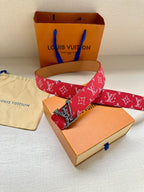 Louis Vuitton belt red monogram strap with gold buckle and leather keeper