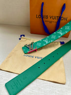 Green Louis Vuitton belt with white monogram, metal LV buckle and adjustable holes