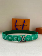 Louis Vuitton belt in green with white monogram pattern and metal LV buckle