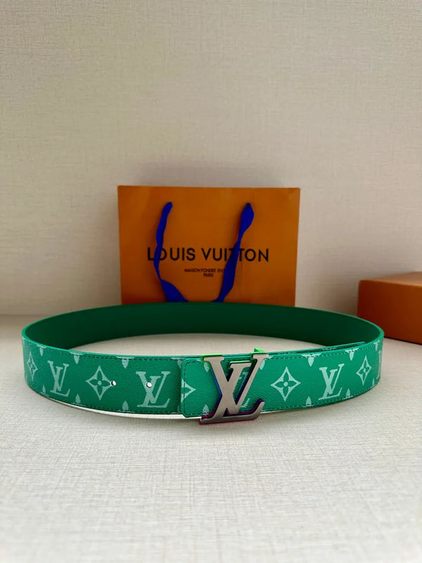 Green Louis Vuitton belt with monogram pattern and LV buckle centered on a flat surface.
