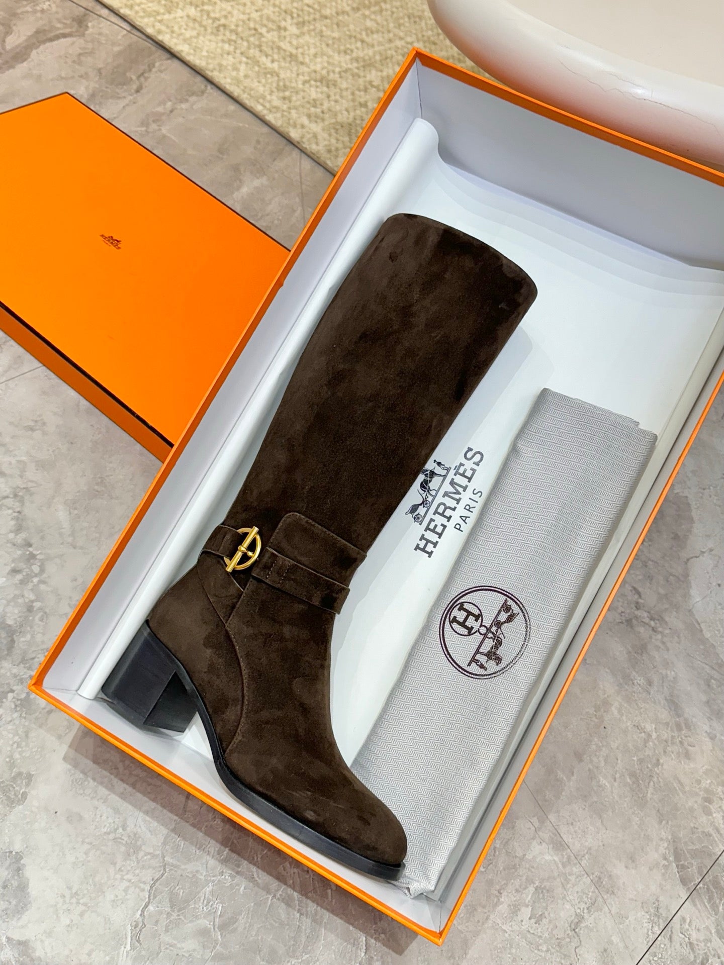 Dark suede knee-high boots in orange gift box with dust bag and logo tag