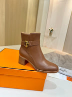 Brown leather ankle boot with block heel and gold buckle detail