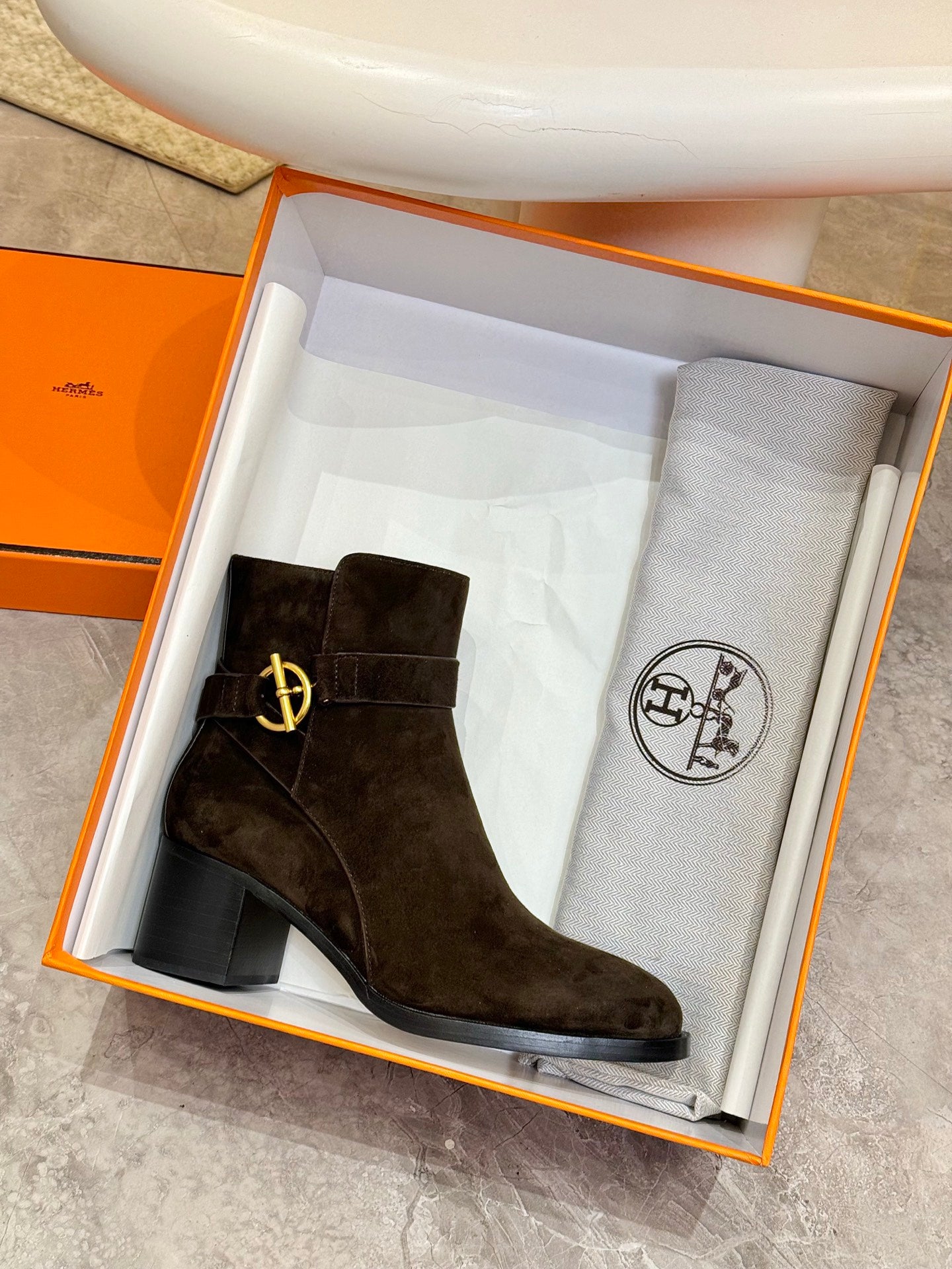 Hermes black suede ankle boot in orange box with gold logo buckle and beige lining