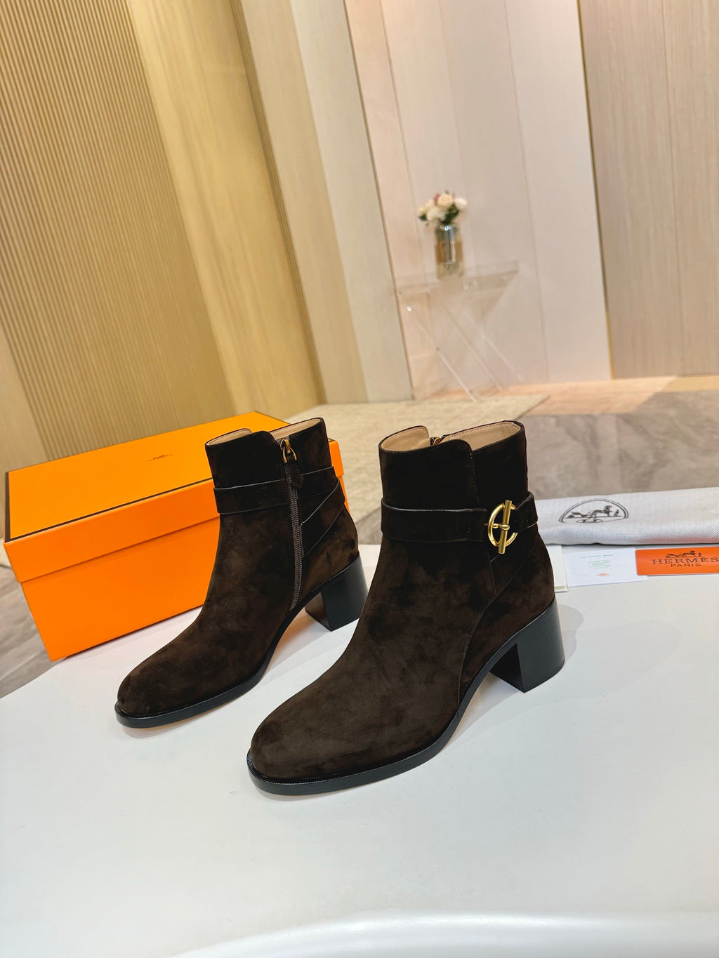 Hermes black suede ankle boots with gold logo buckle and stacked block heel