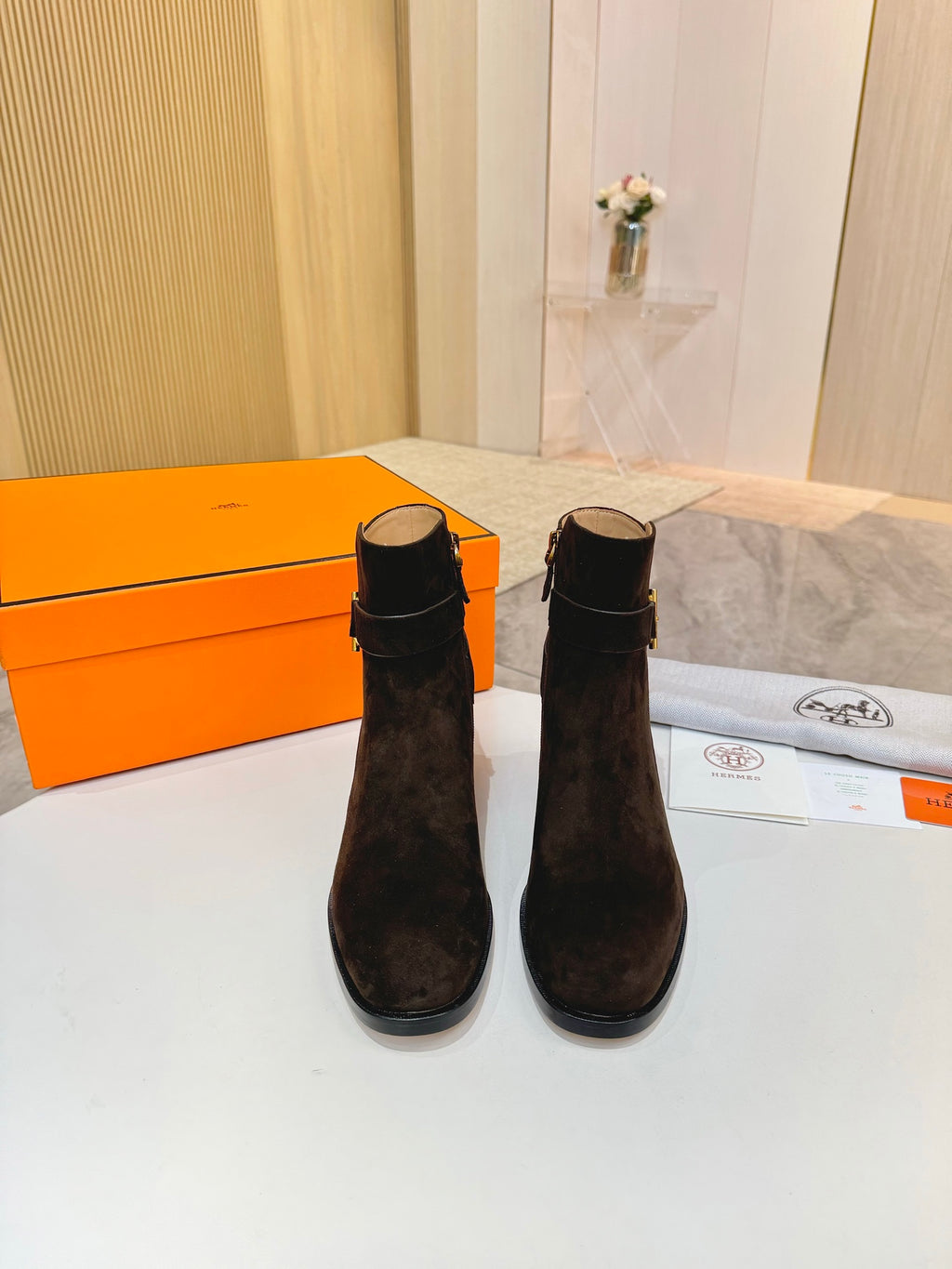 Hermes black suede ankle boots with gold logo buckle and low stacked block heel