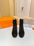 Hermes black suede ankle boots with gold logo buckle and low stacked block heel