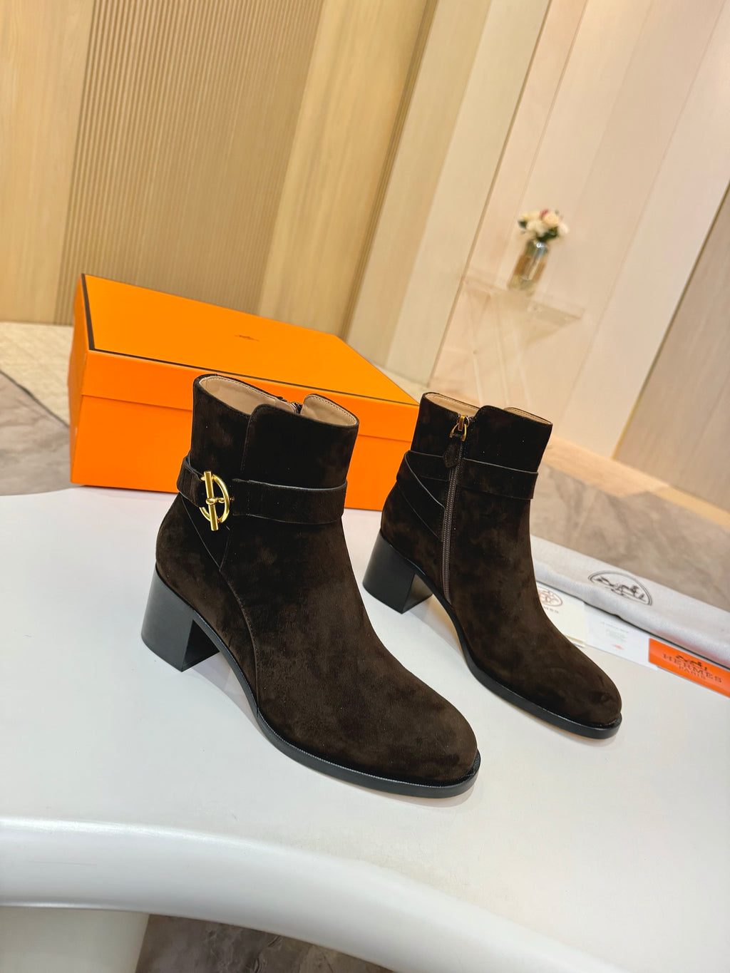 Hermes black suede ankle boots with gold logo buckle and rounded toe block heel