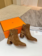 Pair of Hermes ladies suede ankle boots, brown with logo buckle and block heel