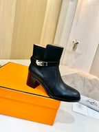 Hermes black leather ankle boots with side buckle strap and block heel