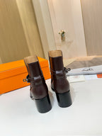 Dark brown leather ankle boots viewed from back with block heel
