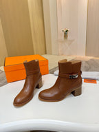 Hermes ladies brown leather ankle boots with strap buckle and mid-height block heel