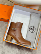 Hermes ladies brown leather ankle boots shown in orange shoe box
