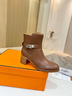 Hermes ladies brown leather ankle boots with buckle strap and block heel