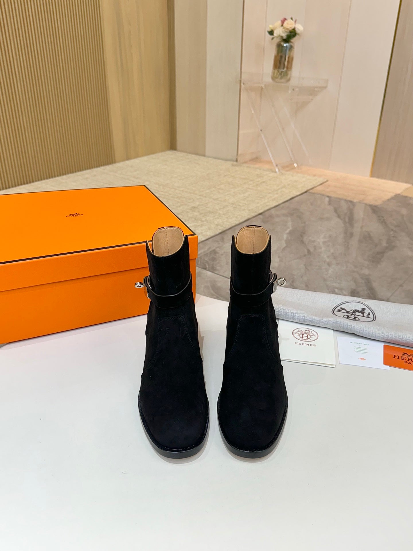 Hermes black suede ankle boots, pair view with rounded toe and block heel