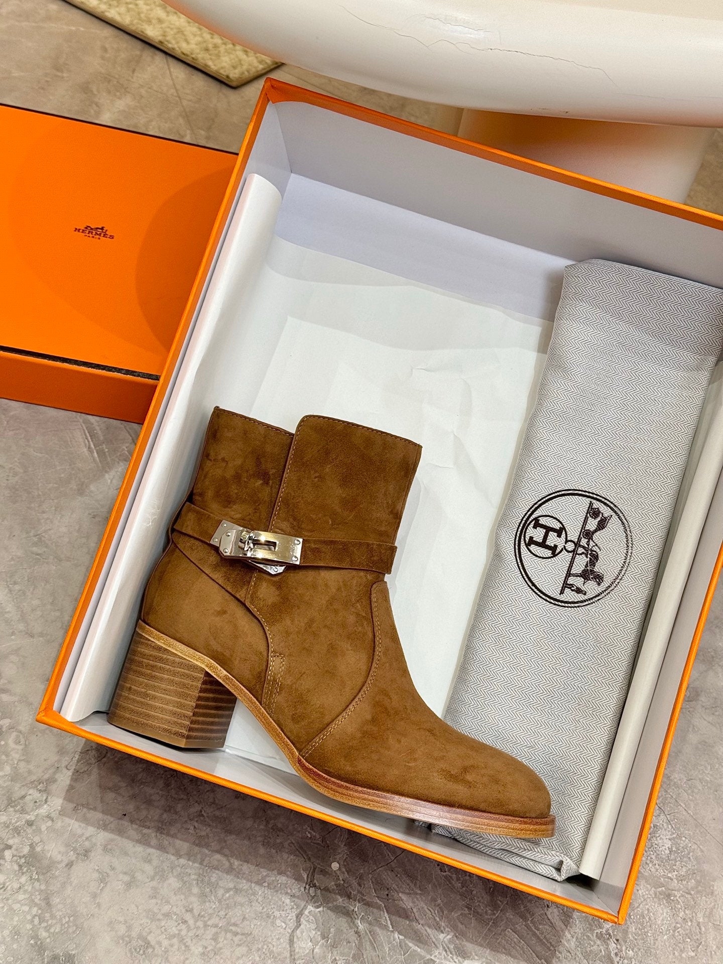 Suede ankle boot with buckle strap and block heel, brown suede in gift box
