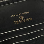 Black interior leather with gold 'MADE IN FRANCE' text and Chanel logo