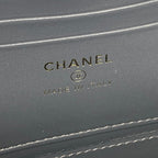 CHANEL made in Italy stamp on blue leather mini handbag exterior