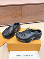 Louis Vuitton black clogs sandals with sculpted sole and round toe perforations