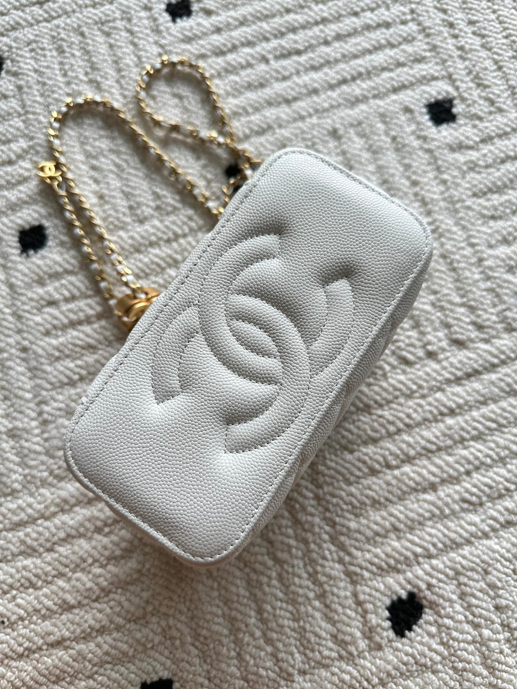Chanel quilted mini bag with CC emblem on flap, white, gold chain strap
