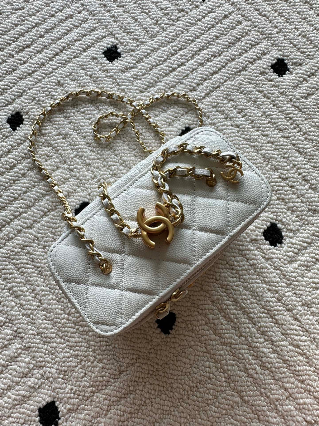 Chanel quilted mini bag with gold chain strap, white with stitched front