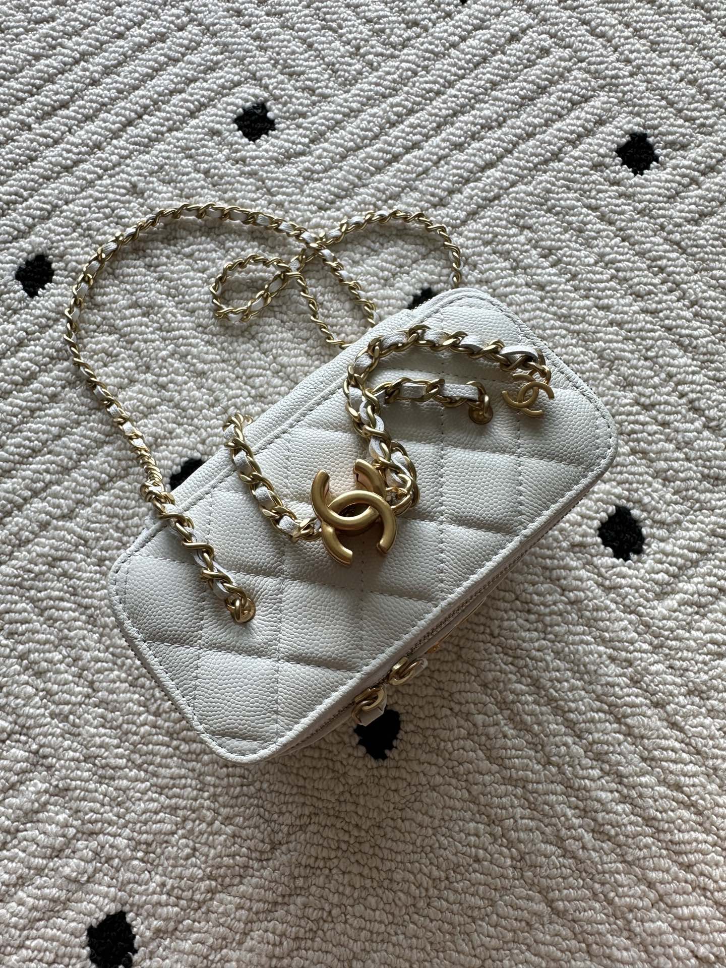 Chanel quilted mini bag with gold chain strap, white with stitched front