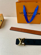 Louis Vuitton monogram belt with dark navy strap, gold LV buckle, and brown lining