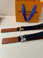 Louis Vuitton monogram belt set with gold LV buckle on dark navy and brown straps