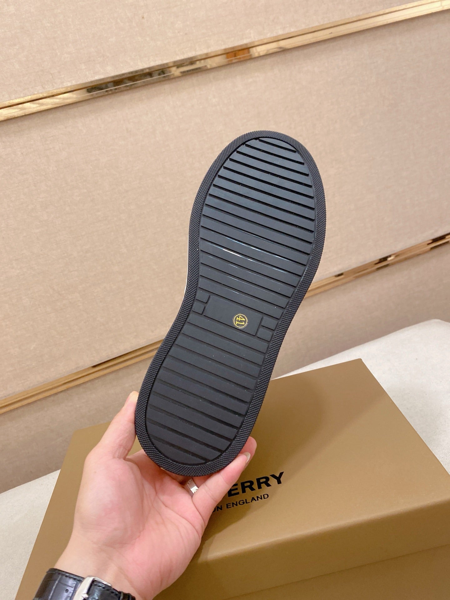 Rubber sneaker outsole with textured grip tread, dark navy/black finish