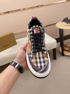 Plaid low-top sneakers with black laces, red B logo patch on heel, white rubber sole