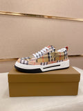 Plaid low-top sneaker with white laces and white/black rubber sole