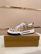 Plaid low-top sneaker with white laces and white/black rubber sole