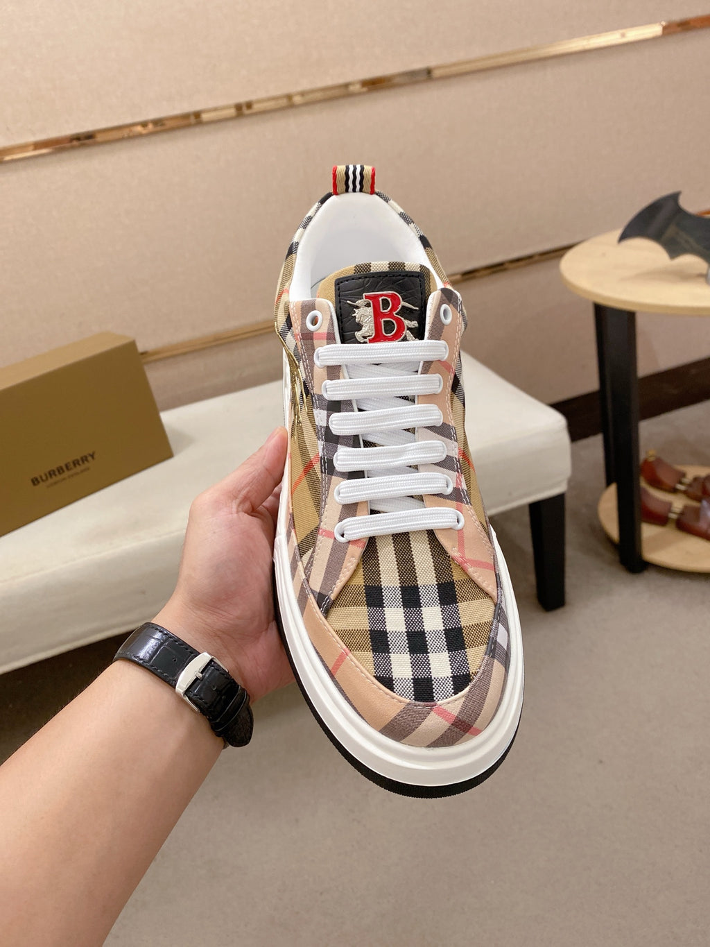 Burberry plaid low-top sneaker with white laces and B logo on tongue