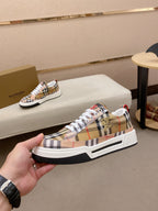 Plaid low-top sneaker side view with white laces, thick white rubber sole