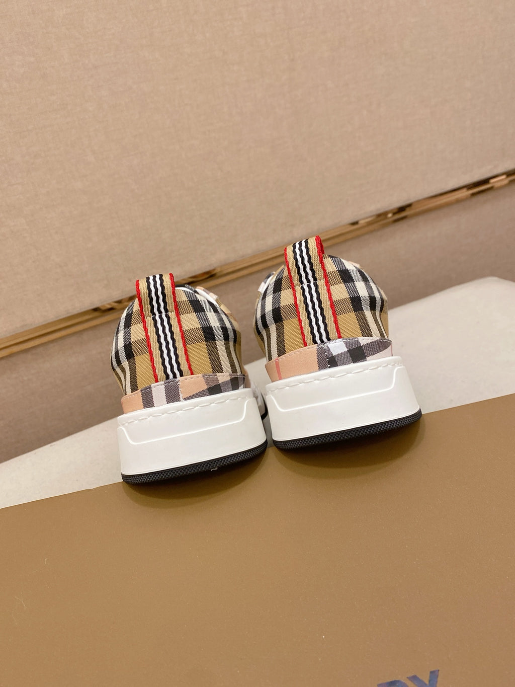 Plaid low-profile sneakers, pair shown from back with white soles