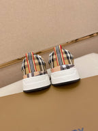 Plaid low-profile sneakers, pair shown from back with white soles