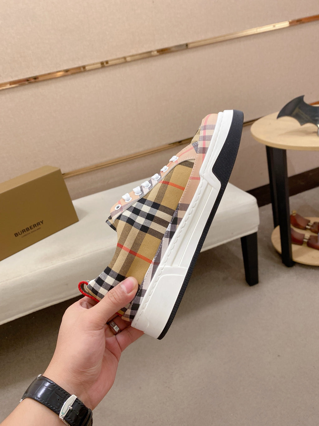 Plaid low-top sneaker side profile with white sole and lace-up front
