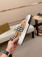 Plaid low-top sneaker side profile with white sole and lace-up front