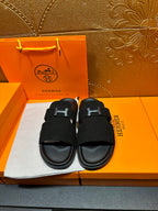 Hermes black slide sandals with oversized H buckle straps