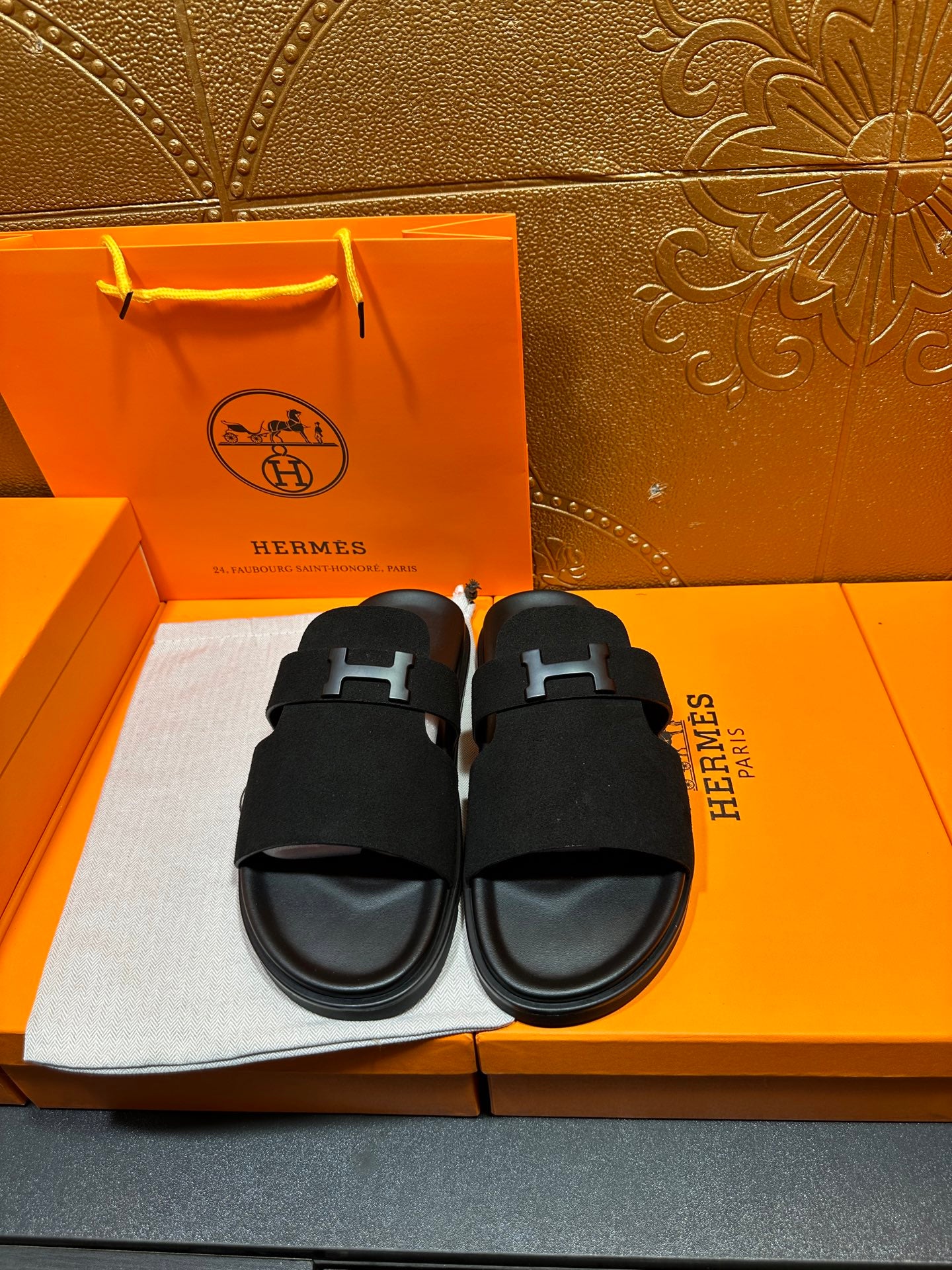 Hermes black slide sandals with oversized H buckle straps