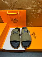 Hermes olive suede slide sandals with black footbed and H buckle straps