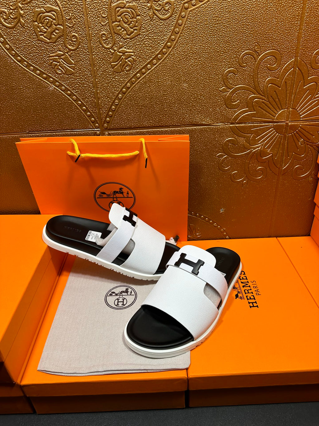 Hermes slide sandals, white leather-look straps with black rubber soles