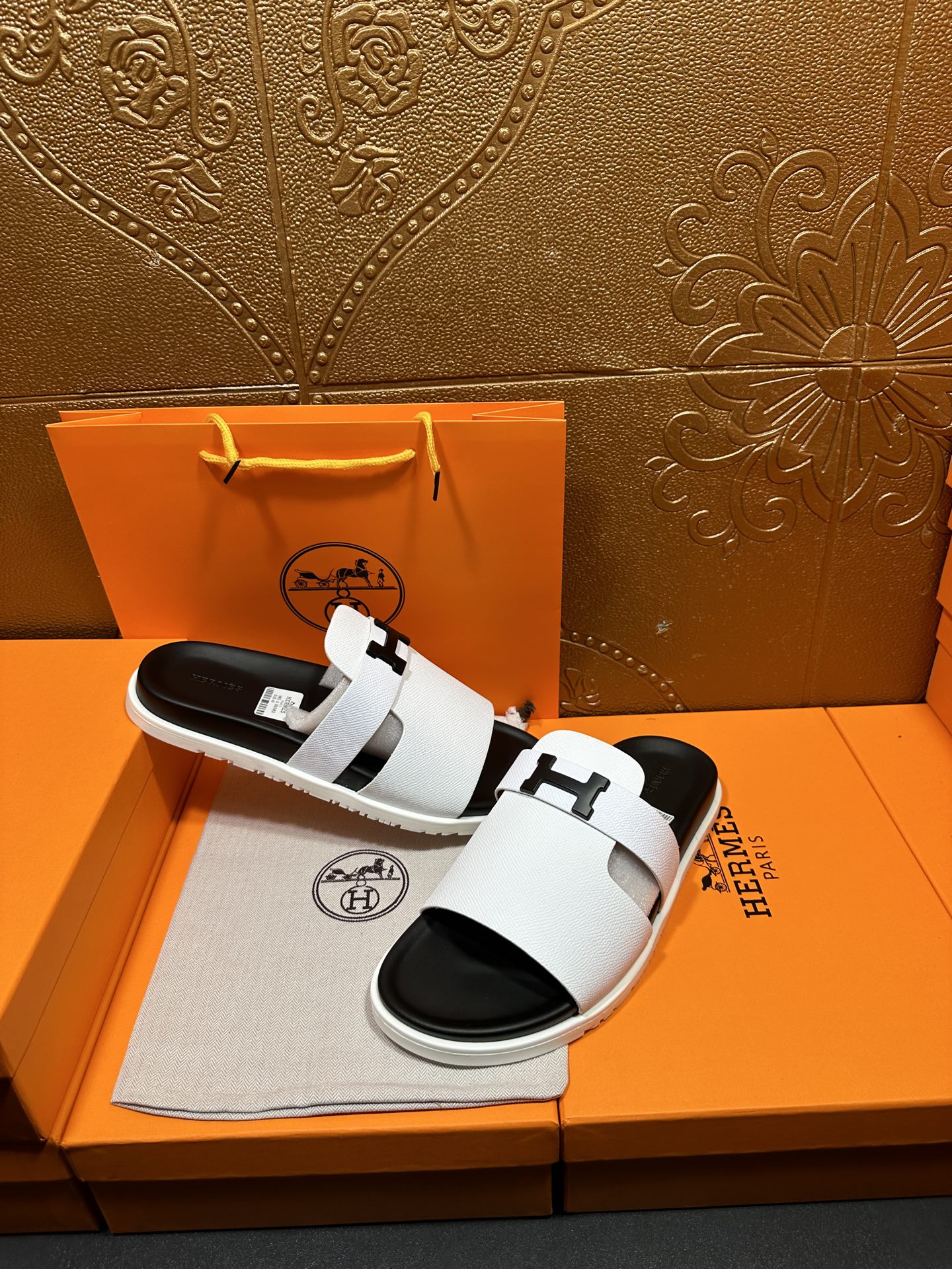 Hermes slide sandals, white leather-look straps with black rubber soles