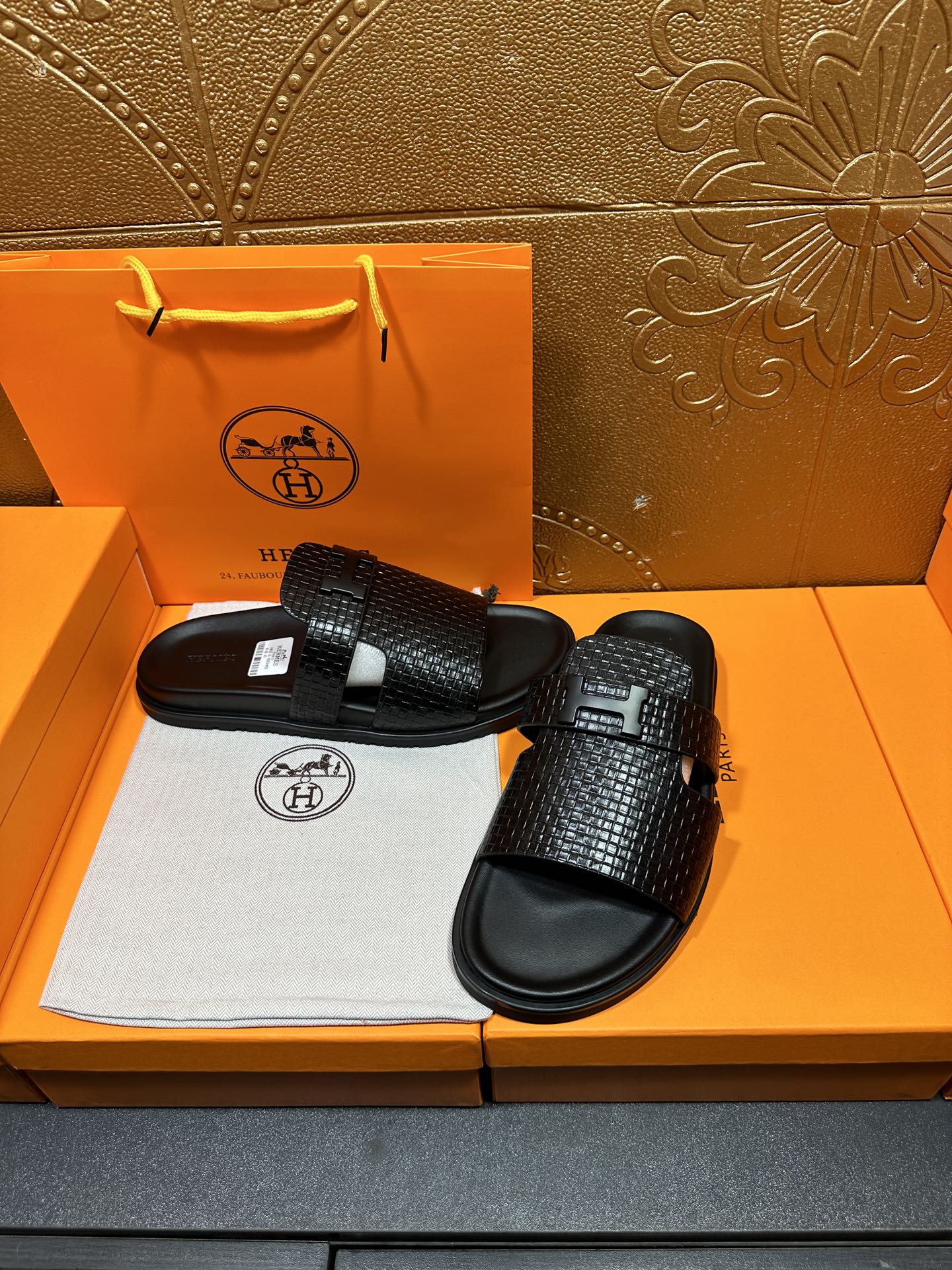 Hermes black textured slide sandals with front wide strap and curved black footbeds