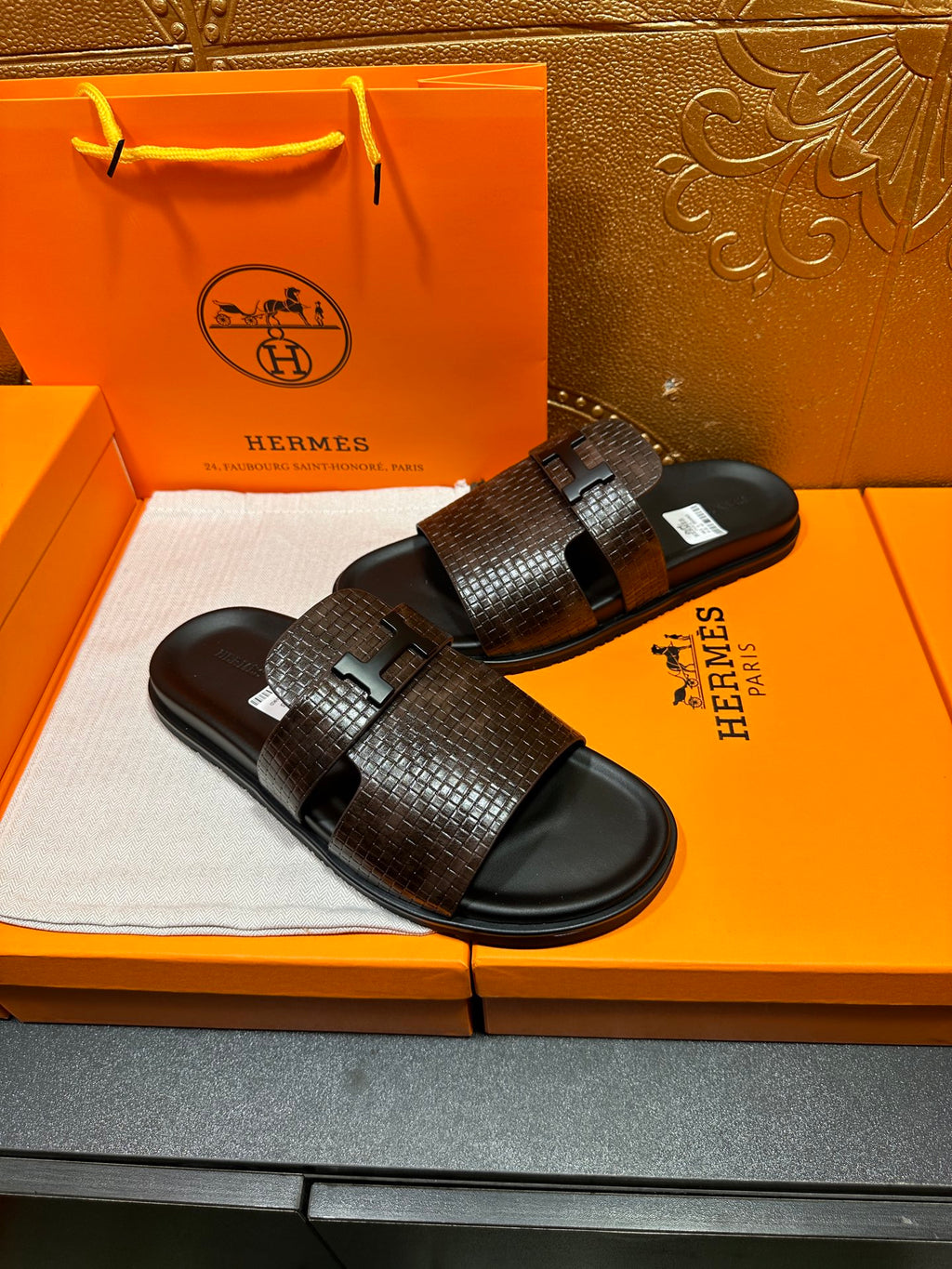 Hermes textured slide sandals, dark brown woven straps and black rubber footbed