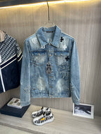 Light blue denim jacket with cross and flower patches